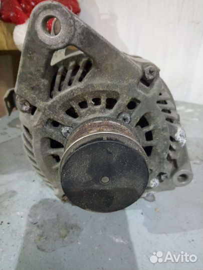 Продам генератор Mazda Demio 1.3