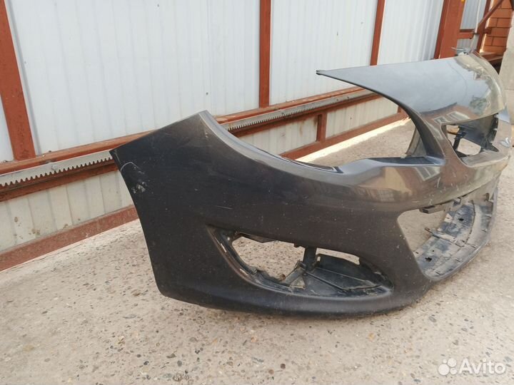 Передний бампер Opel Astra j