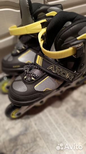 Роликовые коньки