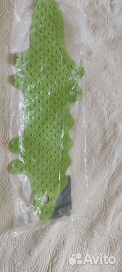 Противоскользящий коврик в ванну