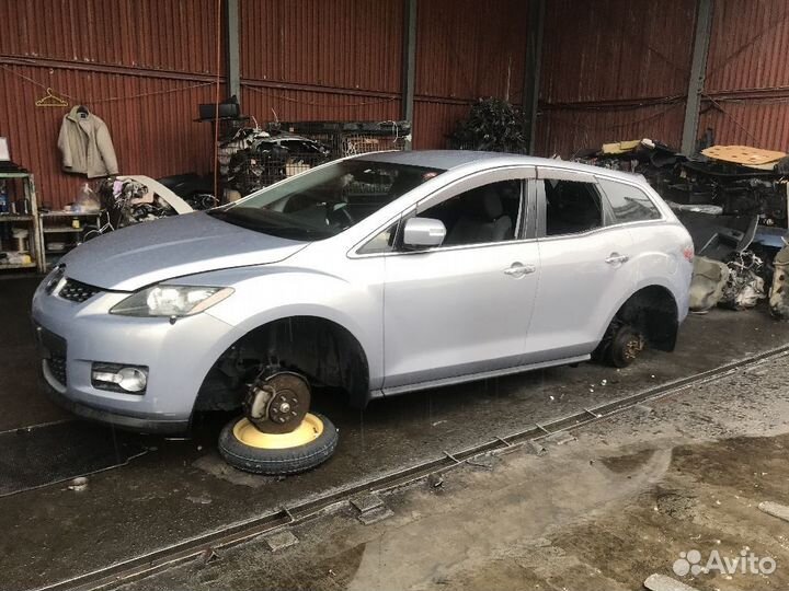 Суппорт задний левый Mazda Cx-7 ER3P