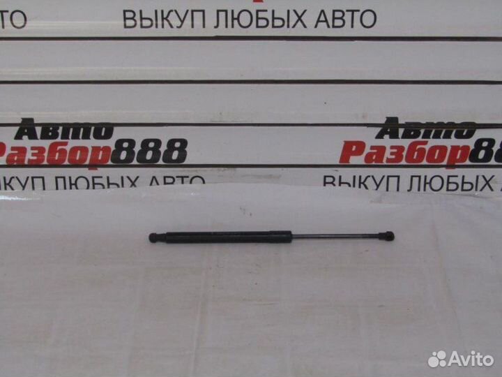 Амортизатор крышки багажника L Renault Duster