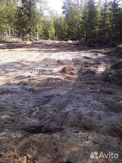 Земельные работы. Экскаватор погрузчик