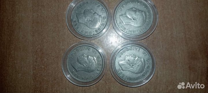 Четыре монеты Великобритании по 2 шиллинга-флорины