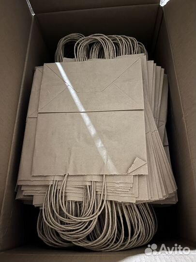 Пакеты бумажные крафт с кручеными ручками оптом