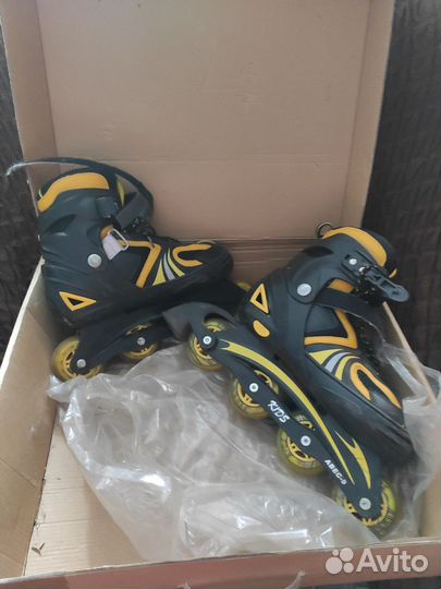 Коньки роликовые