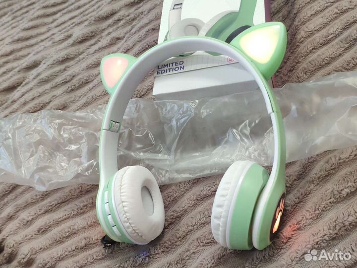 Новые беспроводные наушники с ушками