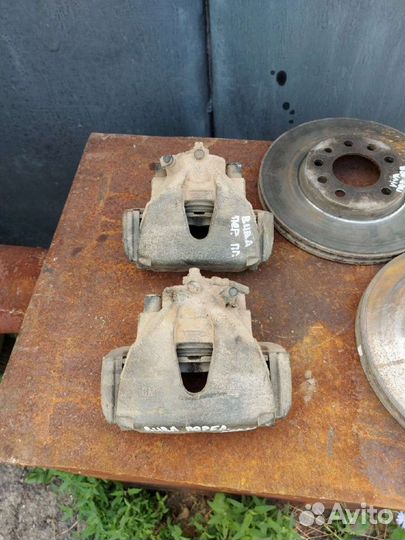 Суппорт передний L\R Opel Astra G Chevrolet Viva