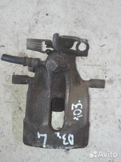 Суппорт задний левый Volvo V40