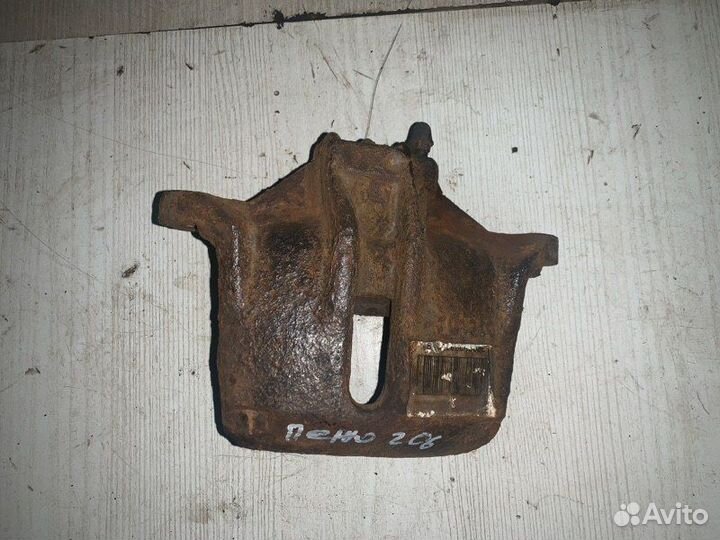 Суппорт тормозной передний левый Peugeot 206