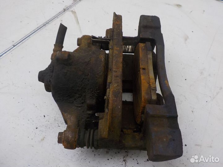 Суппорт тормозной передний левый Honda Civic VII 2