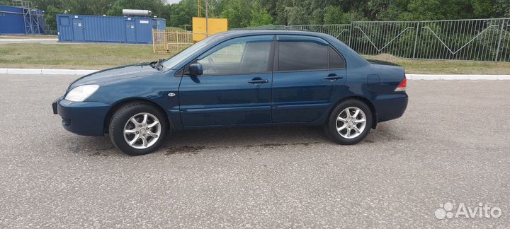 Mitsubishi Lancer 1.6 МТ, 2006, 282 000 км