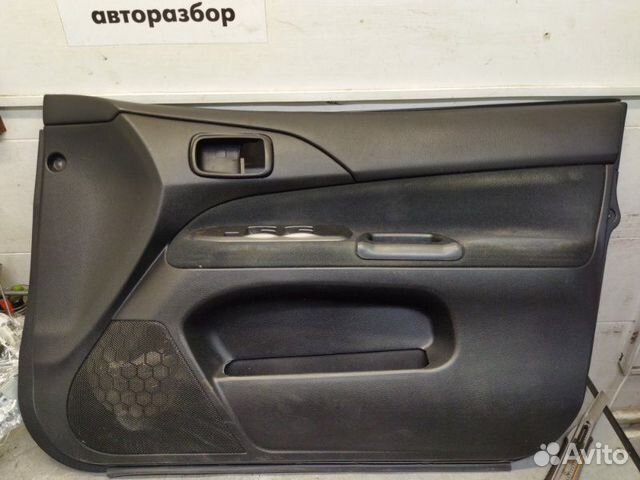 Обшивка двери передняя правая Mitsubishi Lancer 9