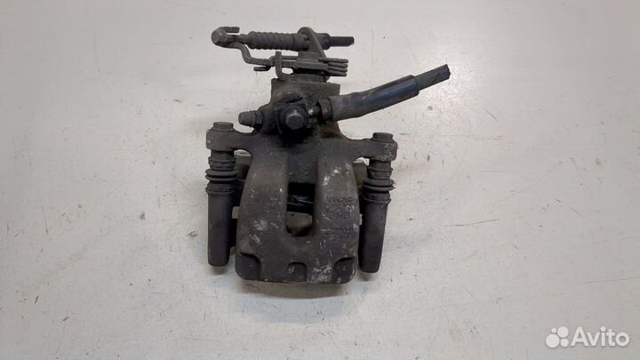 Суппорт правый задний Skoda Octavia (A7)