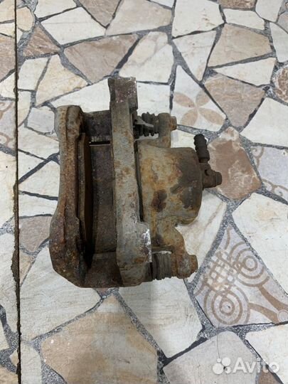 Суппорт тормозной Nissan Teana J32