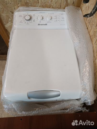 Стиральная машина с вертикальной загрузкой Brandt