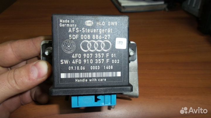 Регулировки угла наклона фар Audi Q7