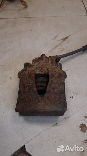 Суппорт тормозной передний левый Audi A3