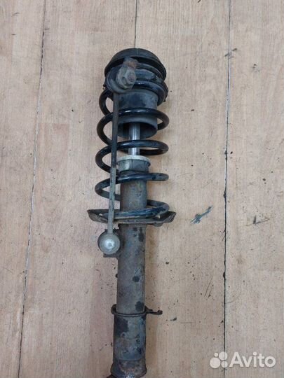 Стойка подвески передняя левая Opel Corsa C Z12XEP