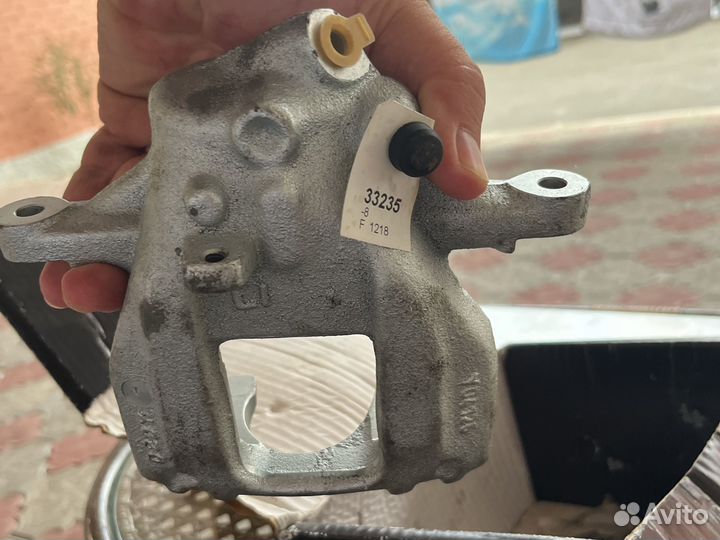 Супорт тормозной задний левый