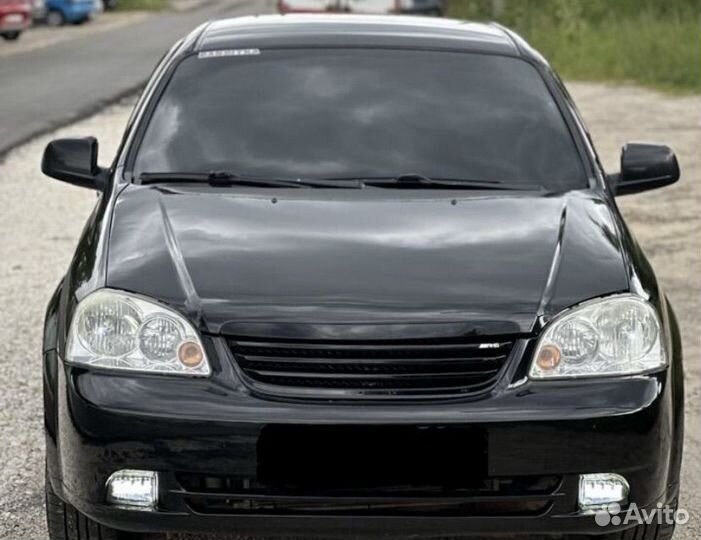 Решека радиатора Лачетти седан