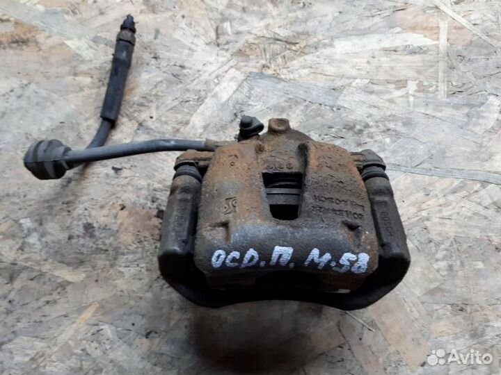 Суппорт передний правый Opel Corsa D 2006-2015