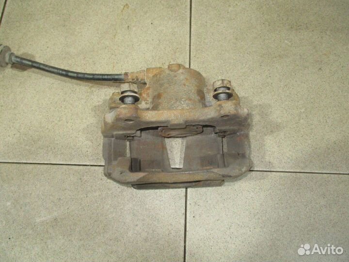 Суппорт передний левый Fiat Doblo 1