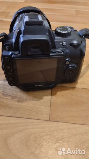 Зеркальный фотоаппарат Nikon D5000 в объективом