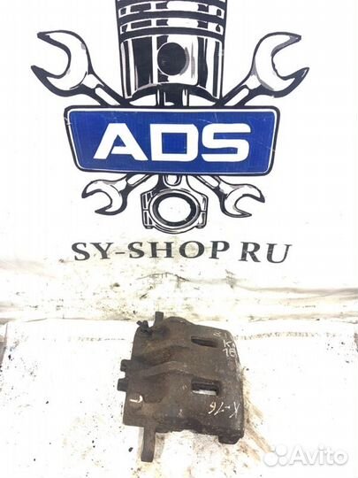 Суппорт тормозной передний левый Ssangyong Actyon