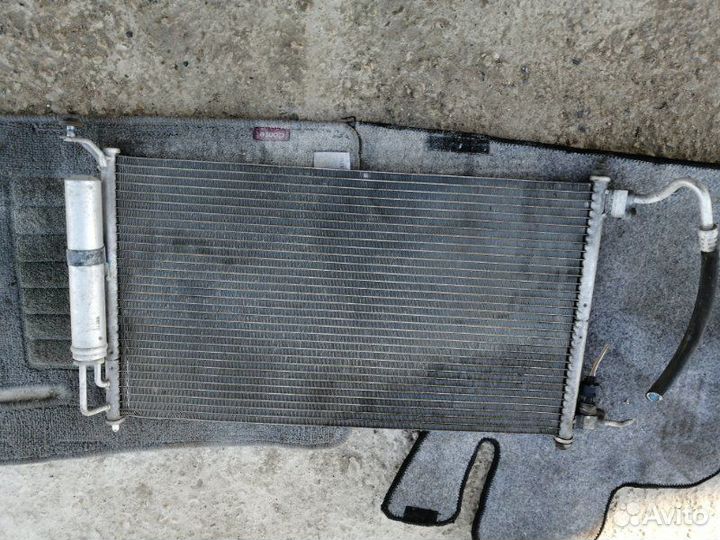 Радиатор кондиционера Nissan March K12