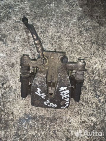 Суппорт задний левый Тойота Авенсис AZT250