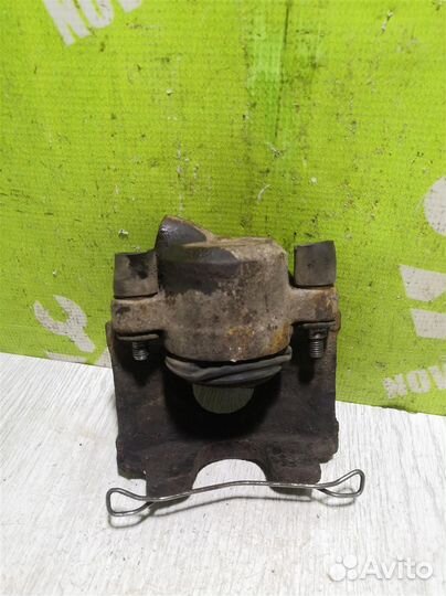 Суппорт передний левый Киа Сепия Шума 96-01