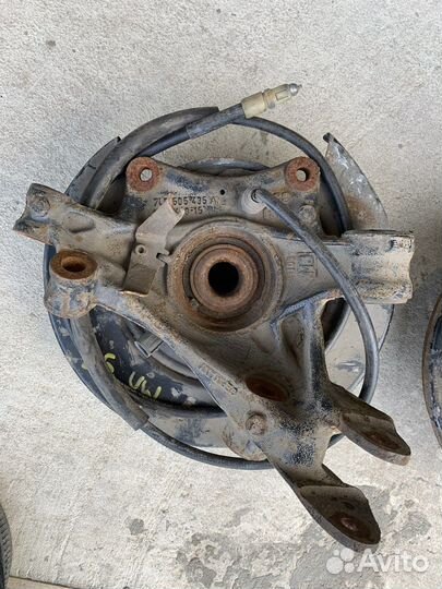 Кулак поворотный задний левый VW Touareg