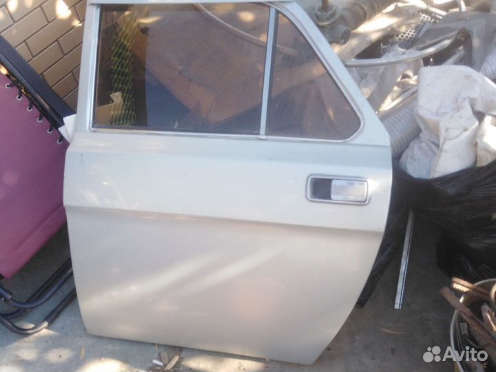 Дверь задняя левая газ-3102