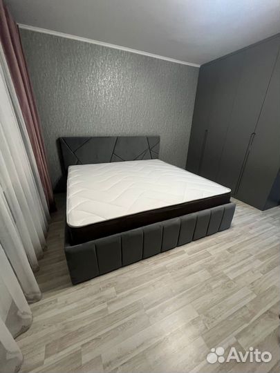 Кровать с подъемным механизмом