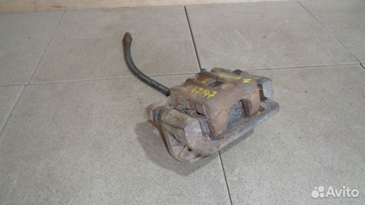 Суппорт задний левый Hyundai Sonata 4 (EF)