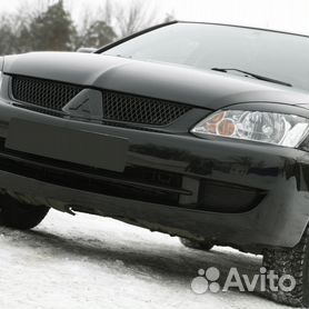 Реснички на фары широкие Mitsubishi Lancer IX (2003-2009).