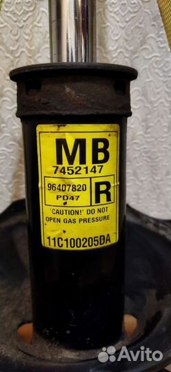 Стойка амортизатора передняя правая lacetti