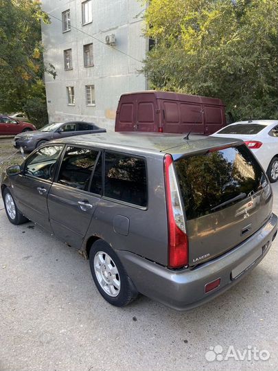 Mitsubishi Lancer 1.6 МТ, 2005, 300 000 км