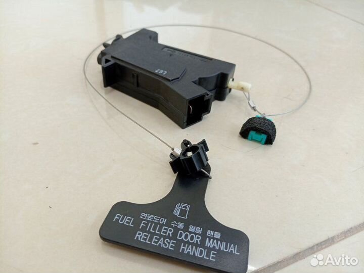 Активатор лючка бензобака Hyundai Grand Santa Fe