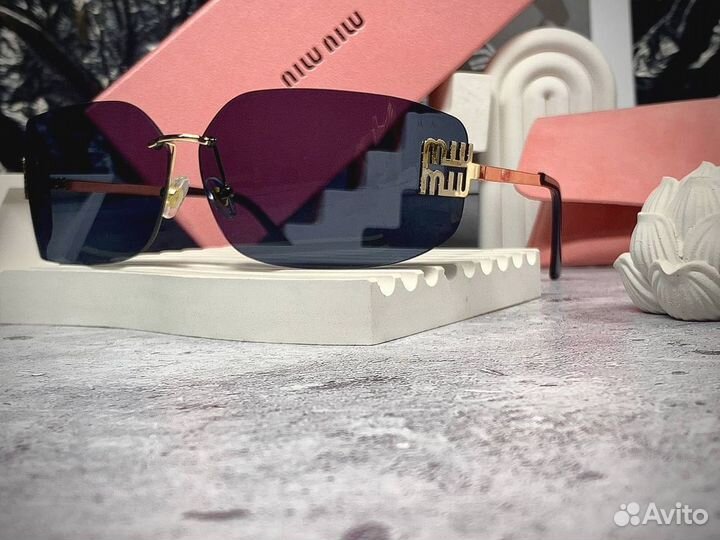 Очки miu miu солнцезащитные