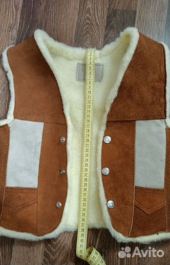 Меховая жилетка