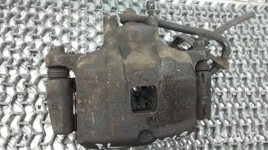 Суппорт тормозной передний левый mitsubishi outlan