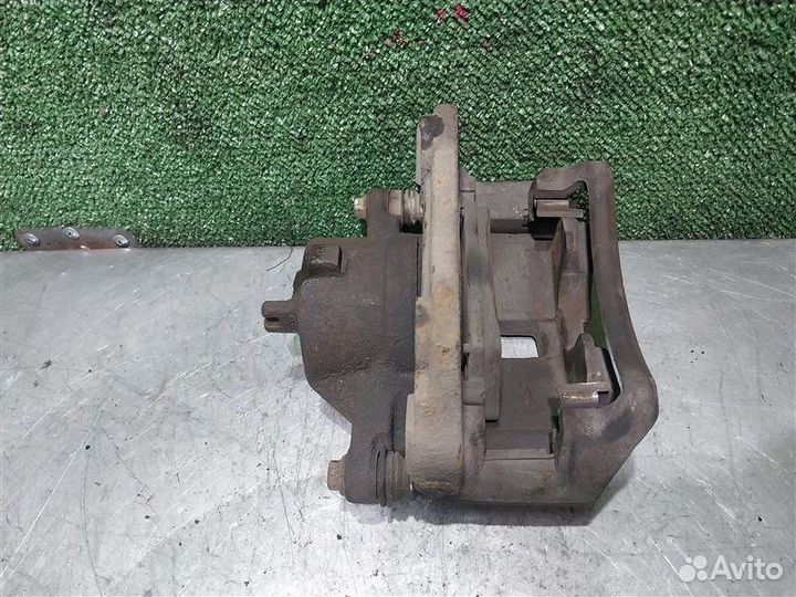 Суппорт тормозной передний правый Nissan Primera