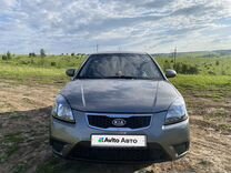 Kia Rio 1.4 AT, 2010, 163 000 км, с пробегом, цена 640 000 руб.