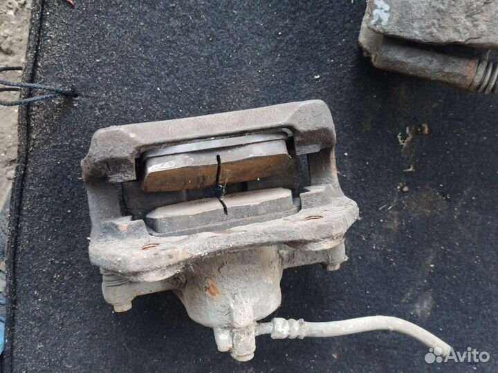 Суппорт передний Nissan Almera N16 Альмера