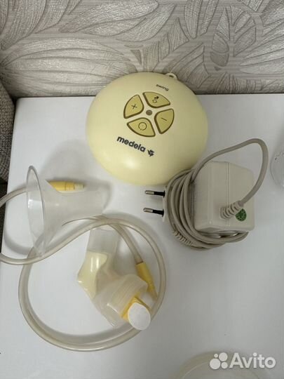 Молокоотсос medela swing +бутылки накладки ниблер
