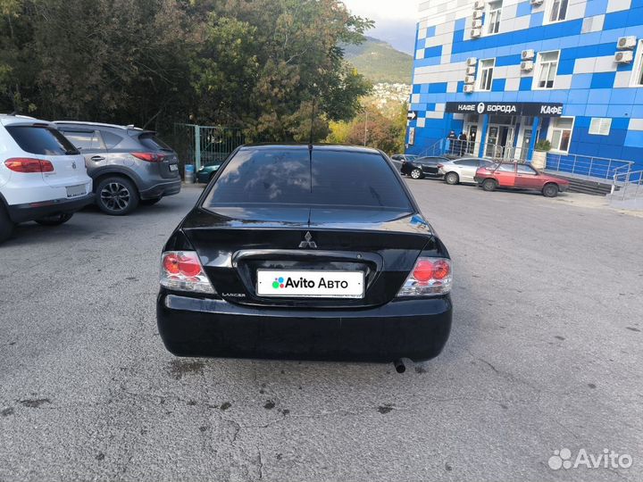 Mitsubishi Lancer 1.6 МТ, 2005, 169 000 км