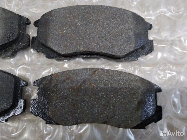 Колодки дисковые передние Mitsubishi Lancer