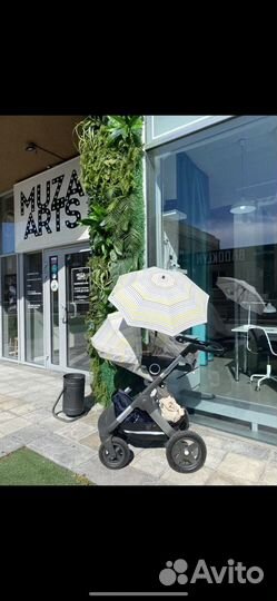 Коляска stokke